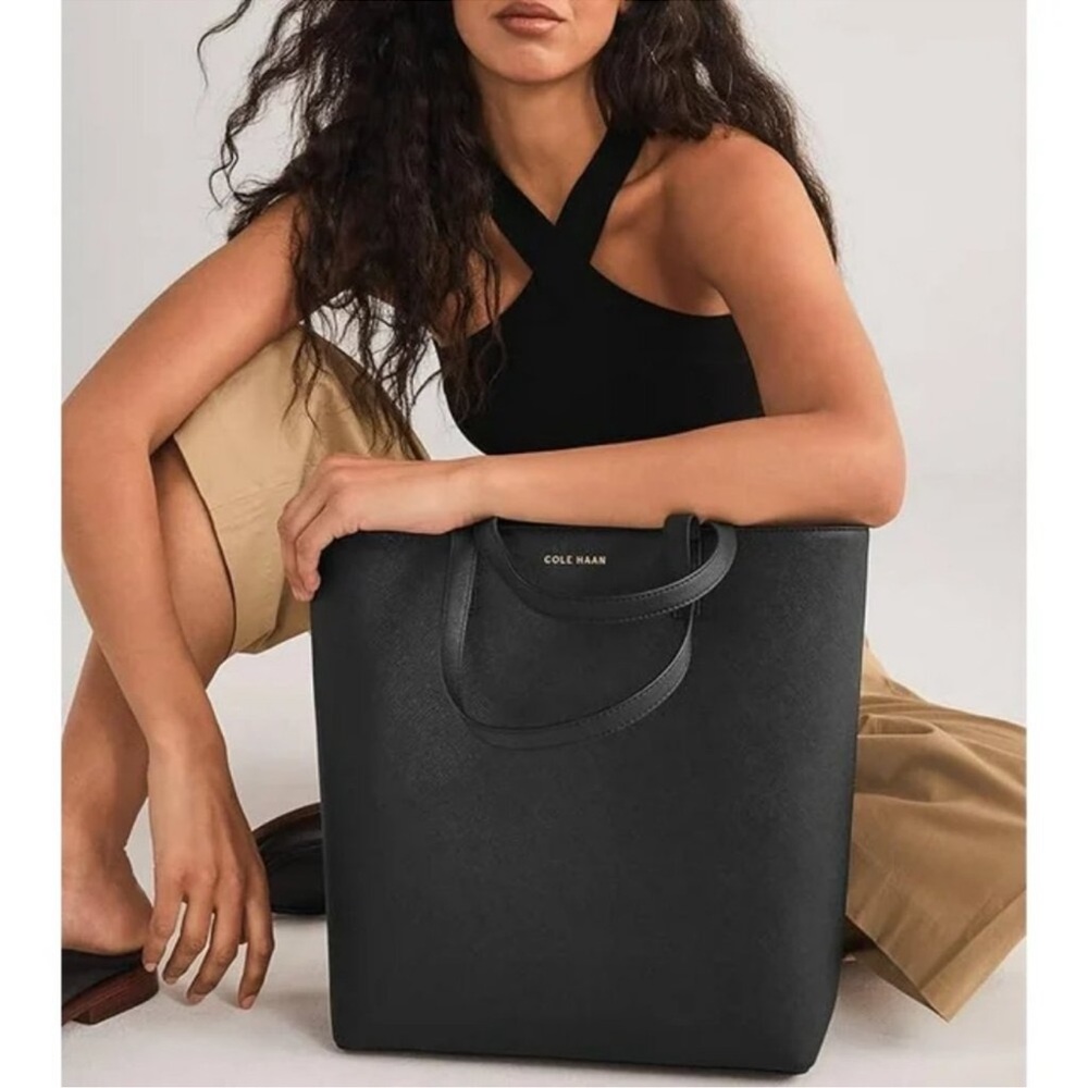 Cole Haan Midnight Blue Leather Tote come with dust jacket